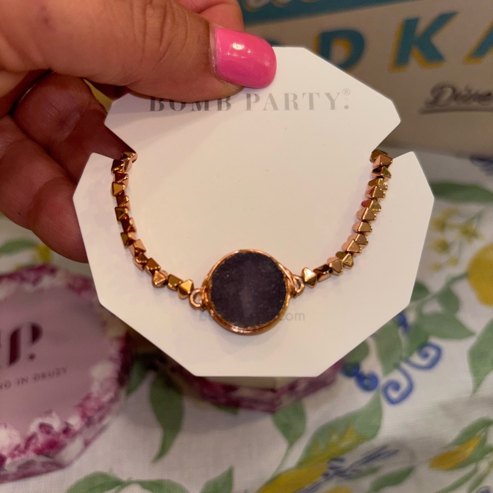 Gold and Black Elegant Bracelet with Striking Design